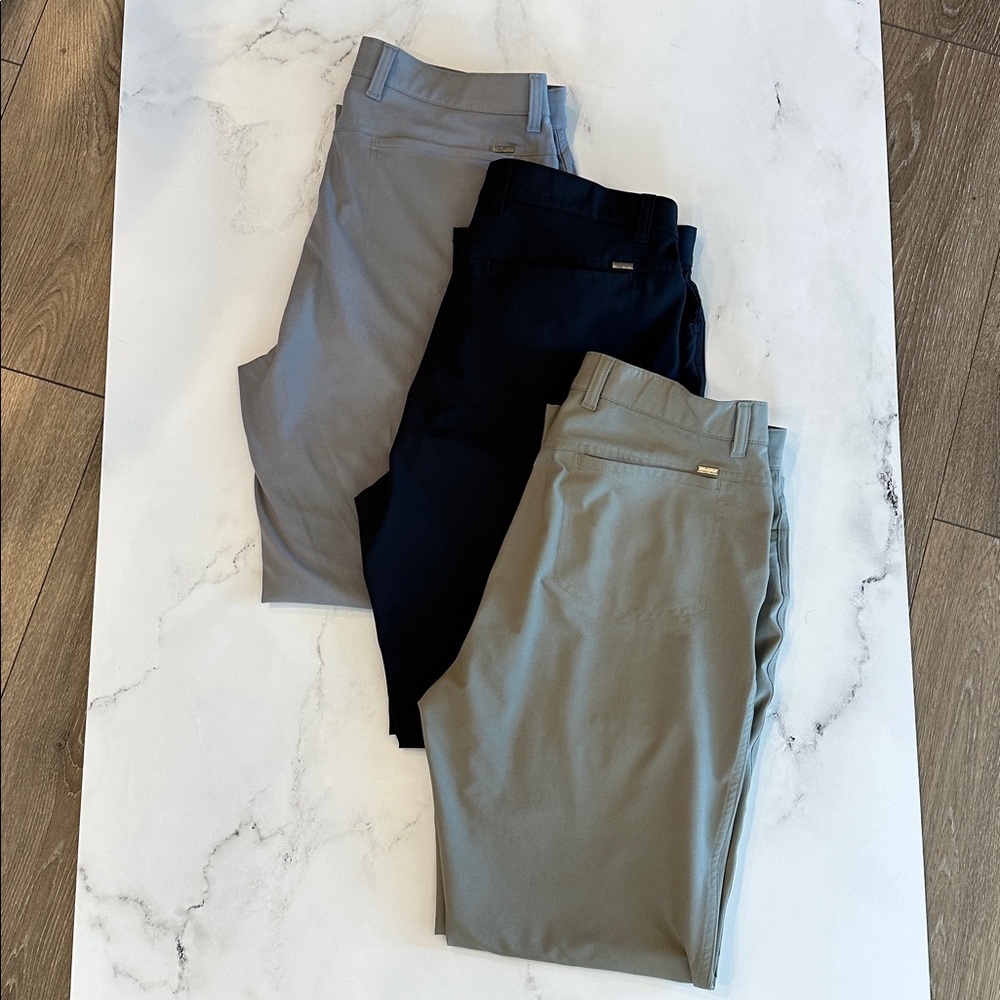 Greg Norman Golf Slacks 3 pr navy, grey & greenish-grey. 32w x 29 length